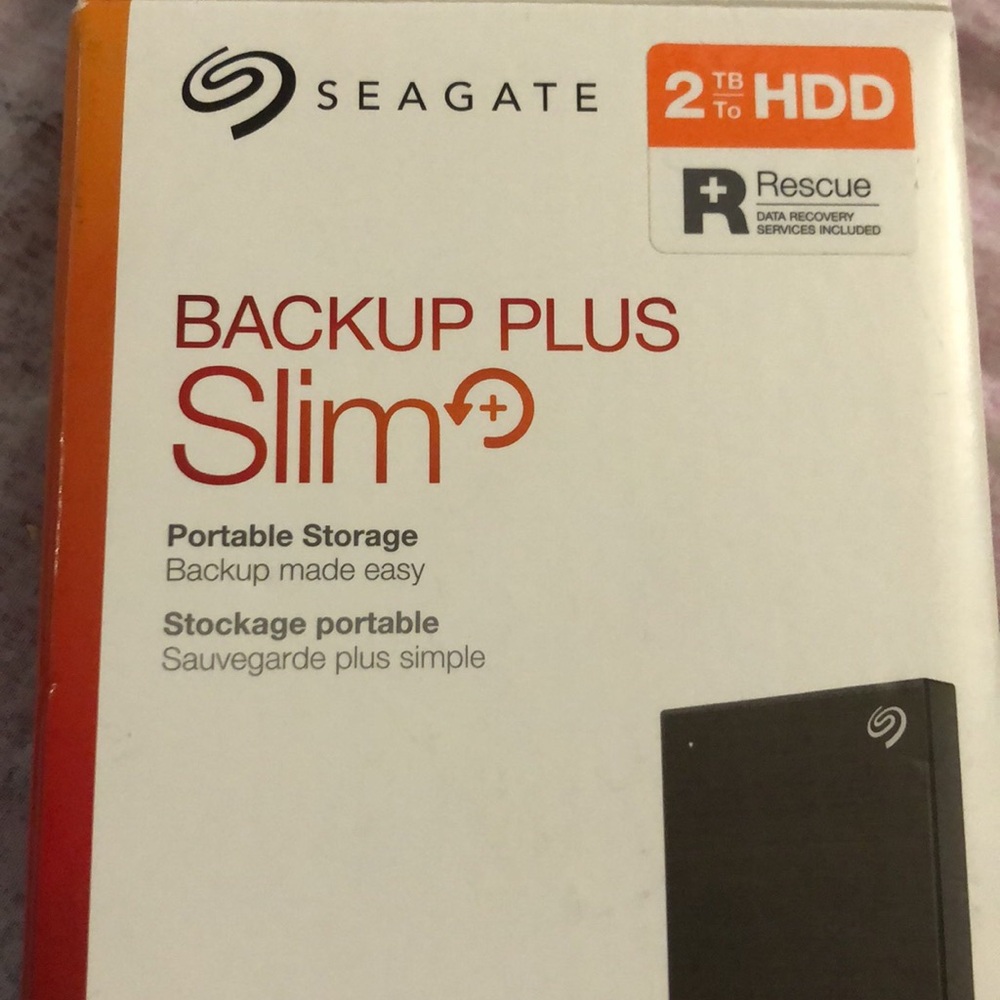 Seagate Backup Plus Slim 2TB Portable Storage - Black/Orange Accents